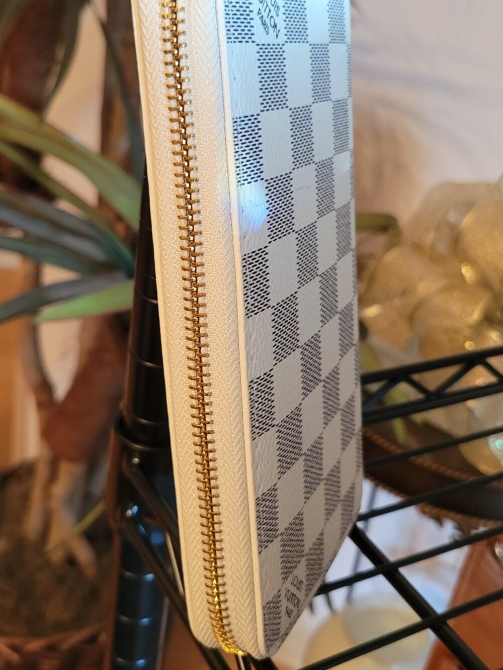 **White w/grey checker long fashion wallet. No brand. Never used.